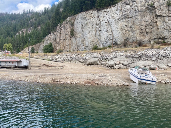 A photo of a stranded boat on a beach